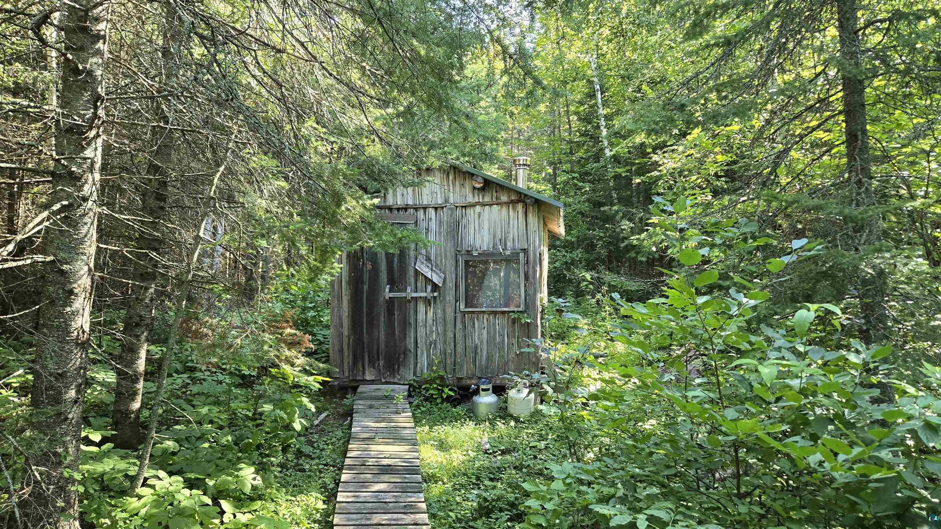 Tbd33 Tbd33 Donovan Point Orr, MN 55771 - Photo 36 of 50 View of shed with a view of trees