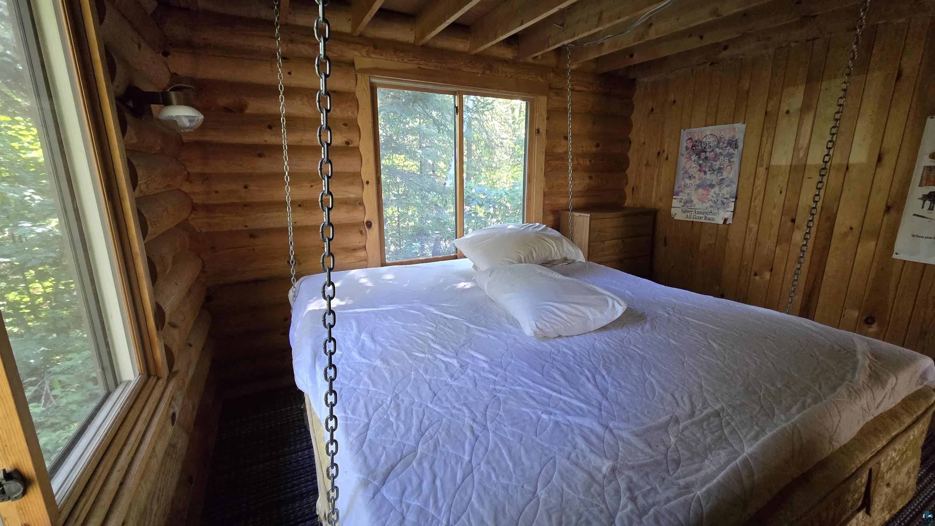 Tbd33 Tbd33 Donovan Point Orr, MN 55771 - Photo 9 of 50 Bedroom with rustic walls