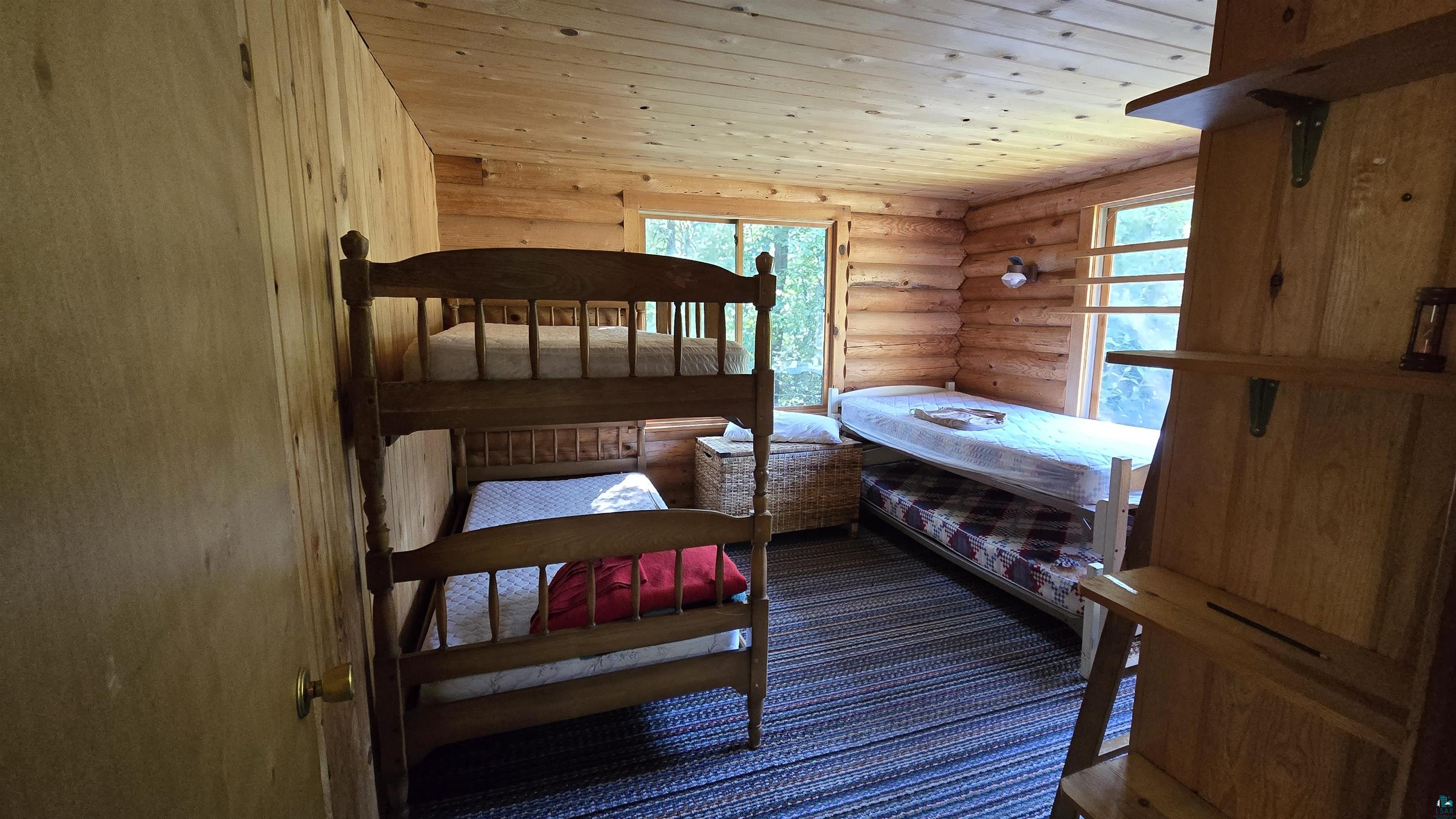 Tbd33 Tbd33 Donovan Point Orr, MN 55771 - Photo 10 of 50 Bedroom with rustic walls and wooden ceiling