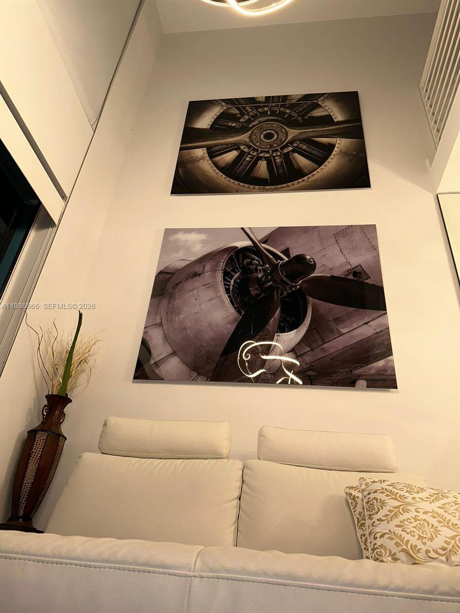 60 Southwest 13th Street, Unit 2422 Miami, FL 33130 - Photo 13 of 33 a close view of a stove and a couch