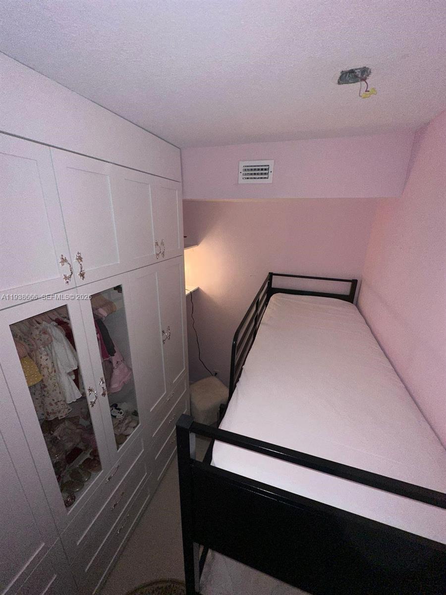 60 Southwest 13th Street, Unit 2422 Miami, FL 33130 - Photo 19 of 33 a view of a hallway with seating area