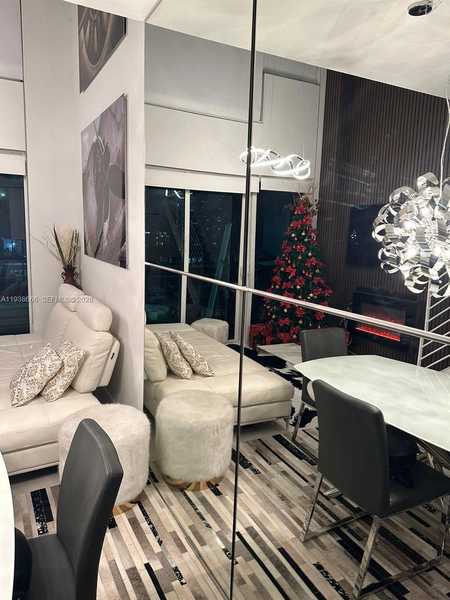 60 Southwest 13th Street, Unit 2422 Miami, FL 33130 - Photo 21 of 33 a living room with furniture