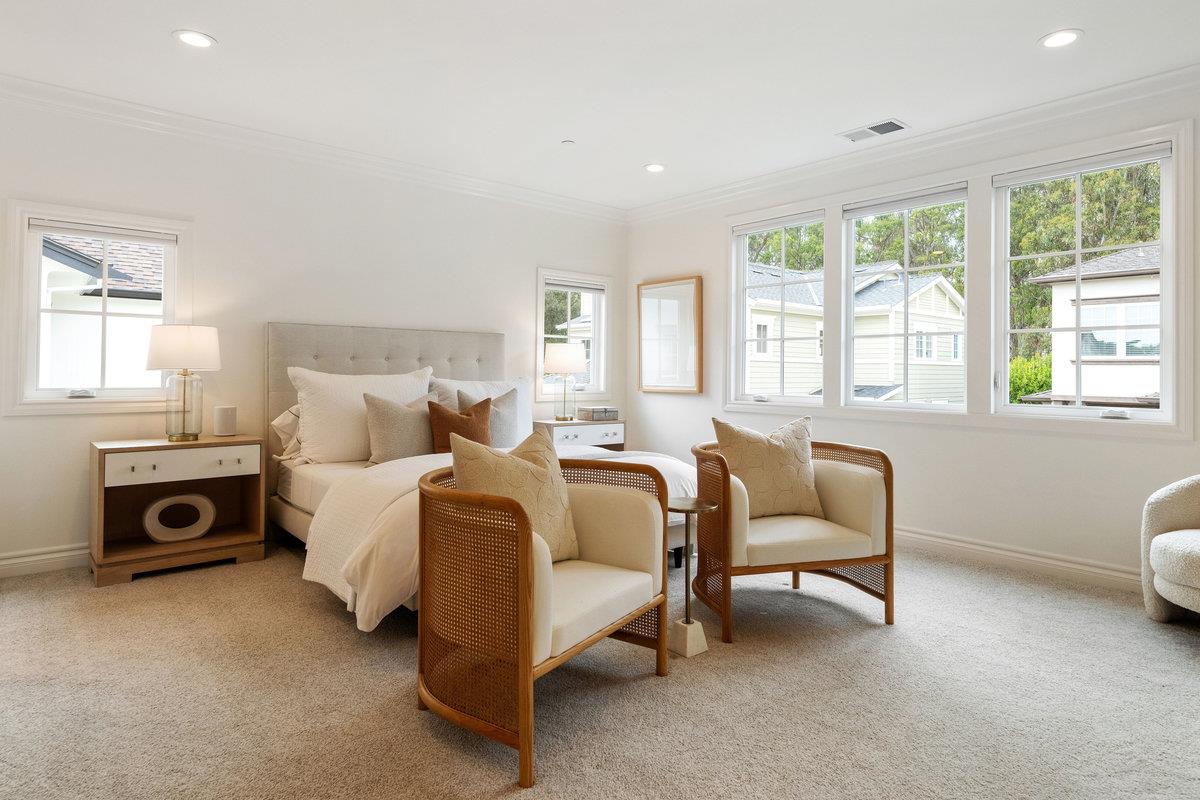 116 Carnoustie Drive Half Moon Bay, CA 94019 - Photo 11 of 27 a bedroom with a bed and a couch