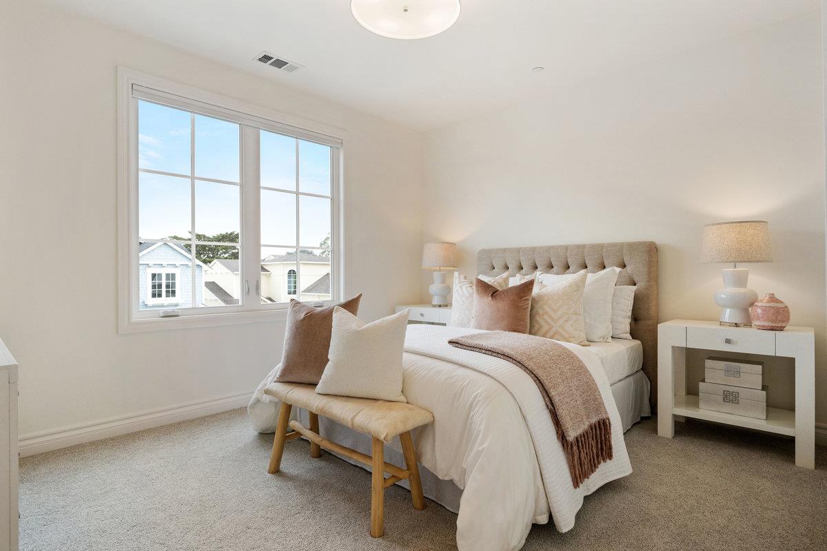 116 Carnoustie Drive Half Moon Bay, CA 94019 - Photo 14 of 27 a bedroom with a bed and a window
