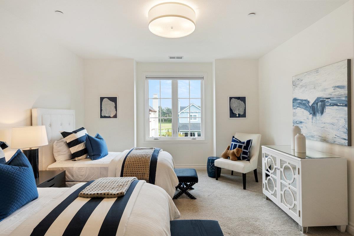 116 Carnoustie Drive Half Moon Bay, CA 94019 - Photo 15 of 27 a bedroom with furniture and a window