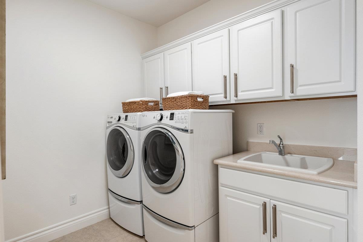 116 Carnoustie Drive Half Moon Bay, CA 94019 - Photo 16 of 27 a utility room with dryer and washer