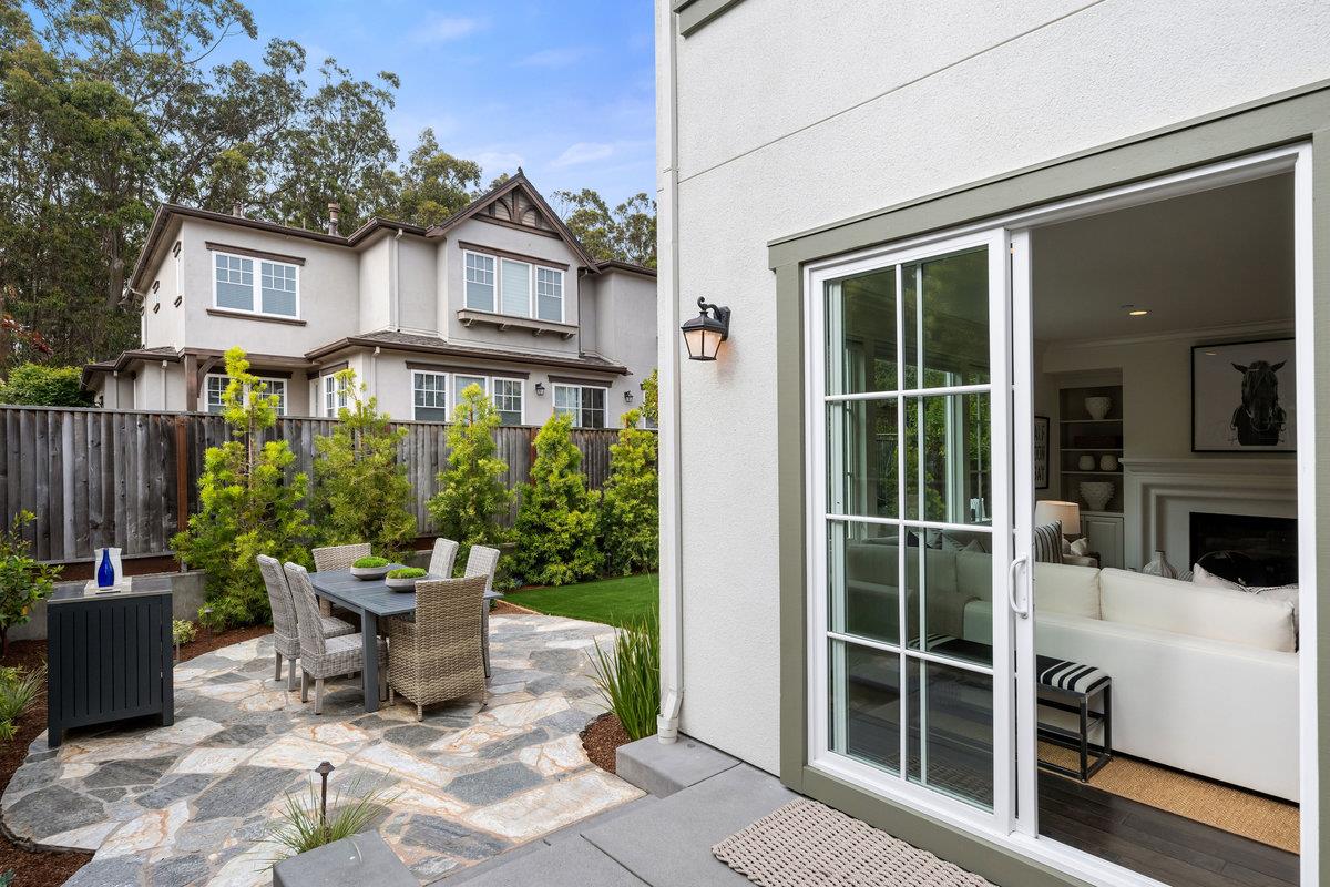 116 Carnoustie Drive Half Moon Bay, CA 94019 - Photo 19 of 27 a view of a patio with table and chairs and potted plants