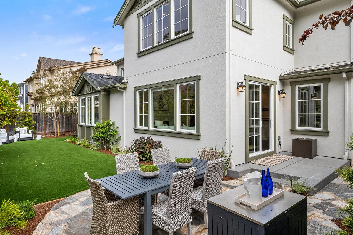 116 Carnoustie Drive Half Moon Bay, CA 94019 - Photo 21 of 27 a view of a patio with table and chairs and potted plants