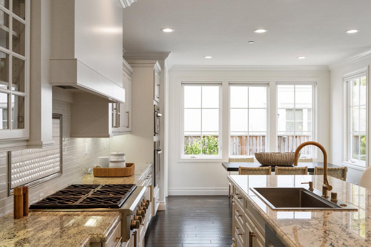 116 Carnoustie Drive Half Moon Bay, CA 94019 - Photo 8 of 27 a kitchen with a stove a sink and a window