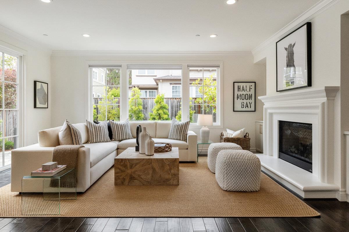 116 Carnoustie Drive Half Moon Bay, CA 94019 - Photo 10 of 27 a living room with furniture and a fireplace
