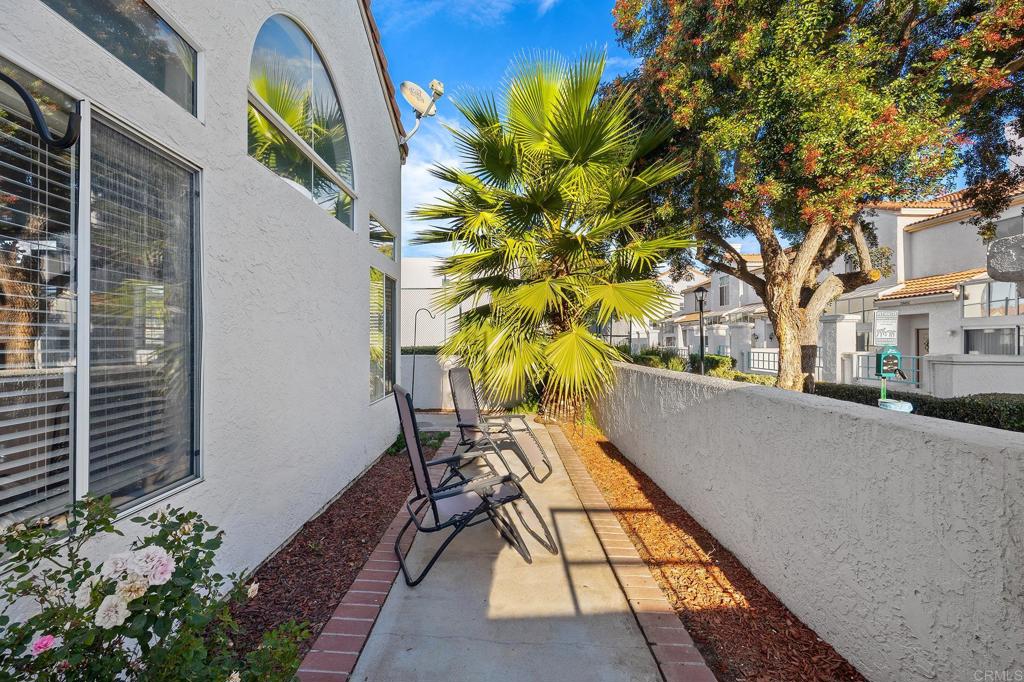 29495 Cara Way Temecula, CA 92591 - Photo 15 of 40 a view of balcony with wooden floor and flowers