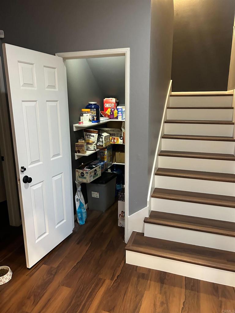 29495 Cara Way Temecula, CA 92591 - Photo 22 of 40 a view of entryway and hall with wooden floor