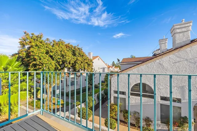 a view of a house with a street