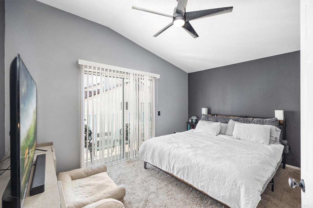 29495 Cara Way Temecula, CA 92591 - Photo 4 of 40 a bedroom with a bed couch and a window