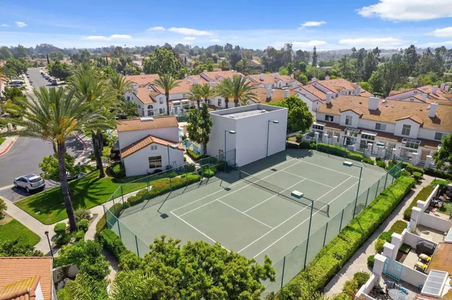 an aerial view of a house with a garden