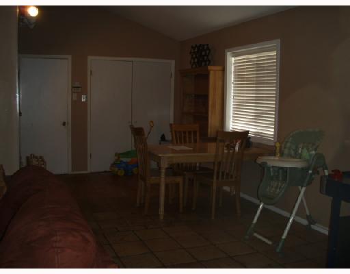 4833 Eider Drive Corpus Christi, TX 78413 - Photo 5 of 5 a dining room with furniture and a window