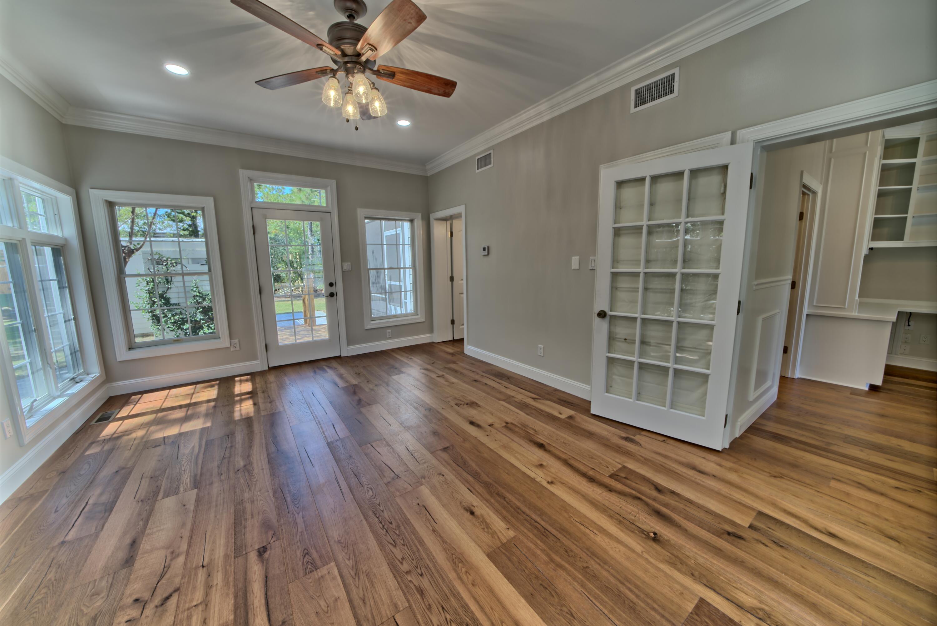 521 Clareon Drive Inlet Beach, FL 32461 - Photo 12 of 66 wooden floor in an empty room with a window