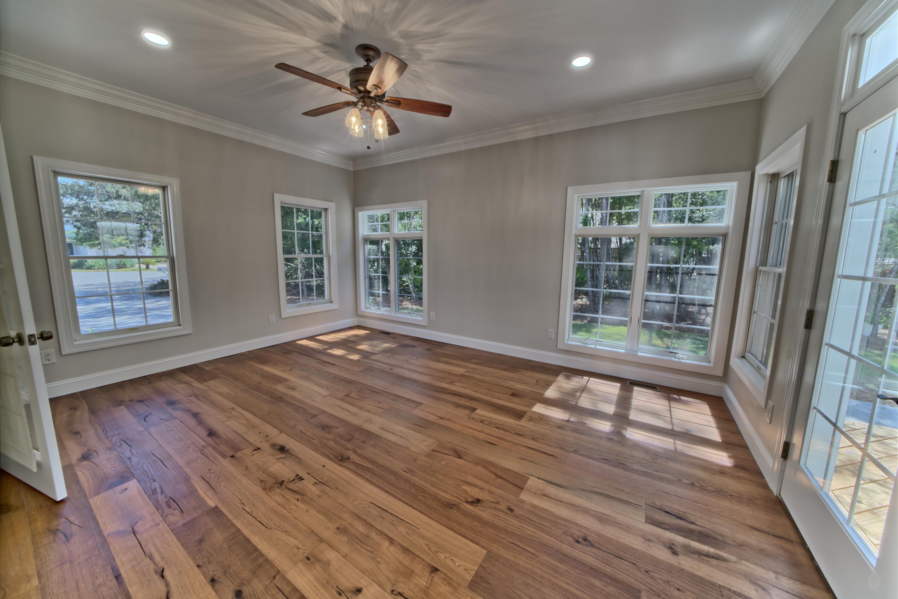 521 Clareon Drive Inlet Beach, FL 32461 - Photo 14 of 66 wooden floor in an empty room with a window