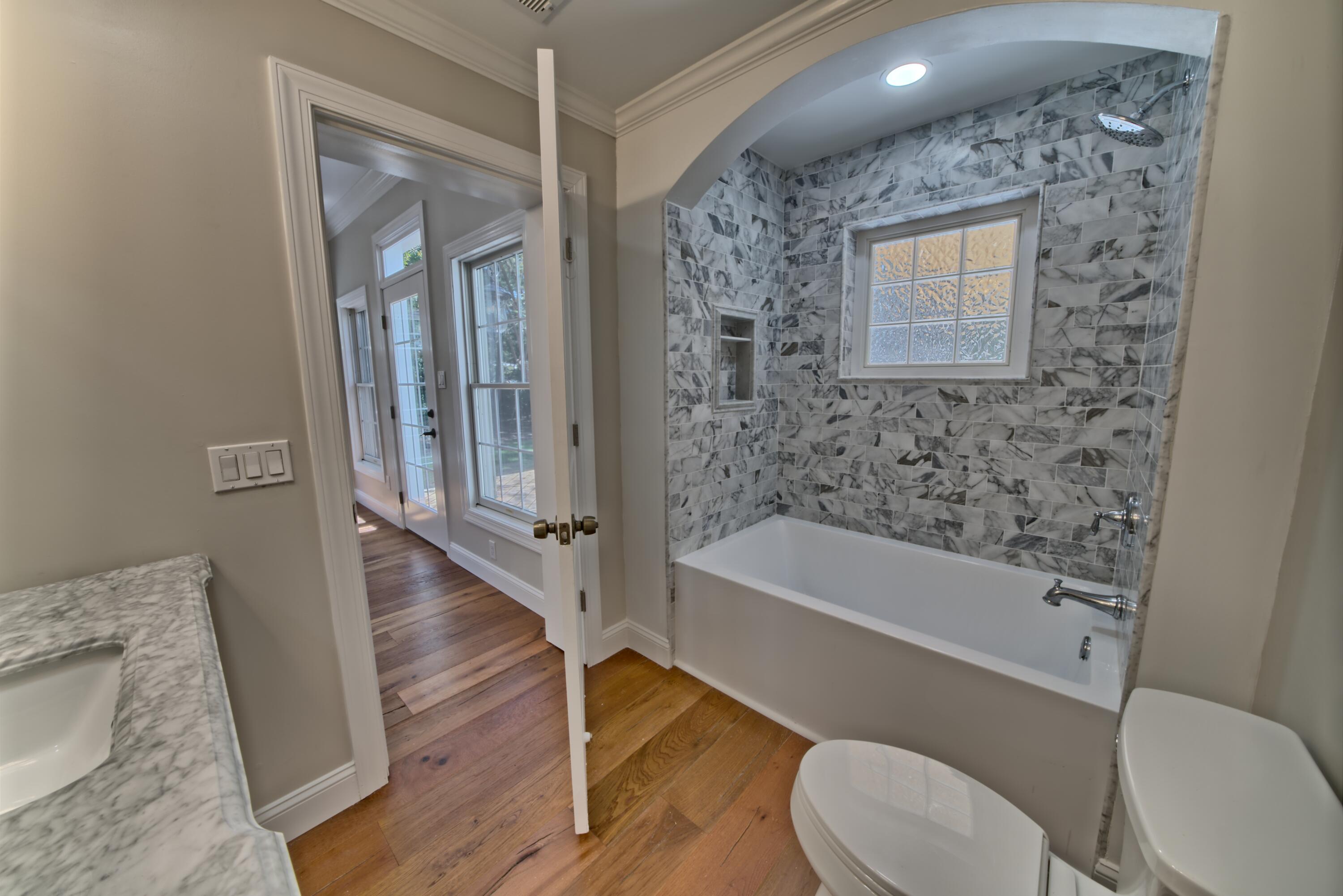 521 Clareon Drive Inlet Beach, FL 32461 - Photo 15 of 66 a bathroom with a toilet a sink and bathtub