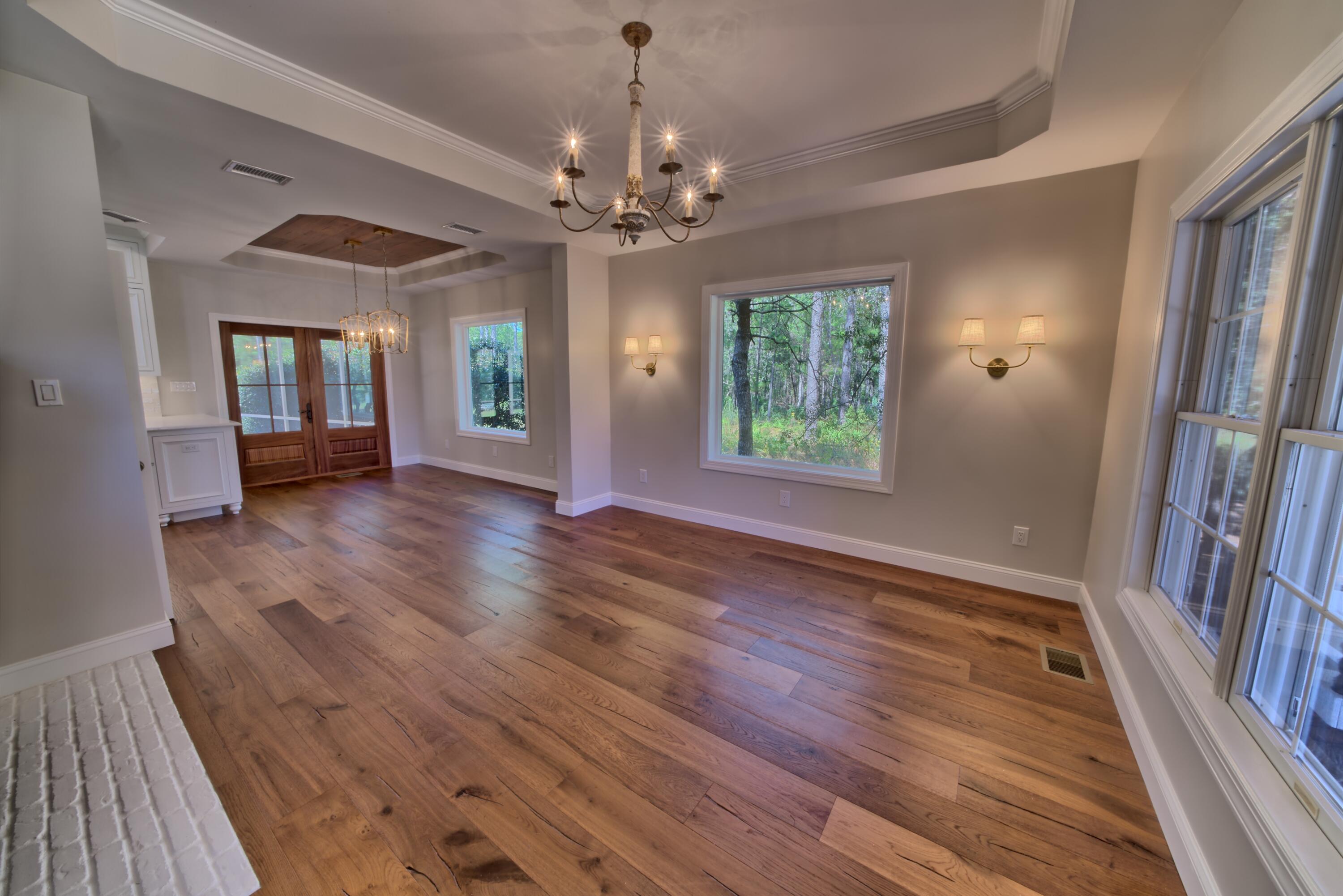 521 Clareon Drive Inlet Beach, FL 32461 - Photo 2 of 66 wooden floor in an empty room with a window