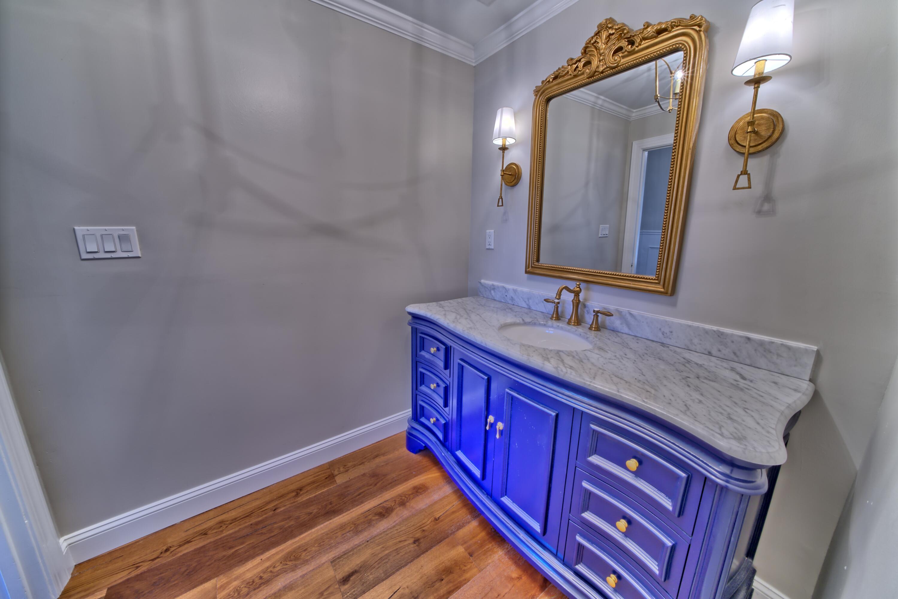 521 Clareon Drive Inlet Beach, FL 32461 - Photo 21 of 66 a bathroom with a sink and a mirror