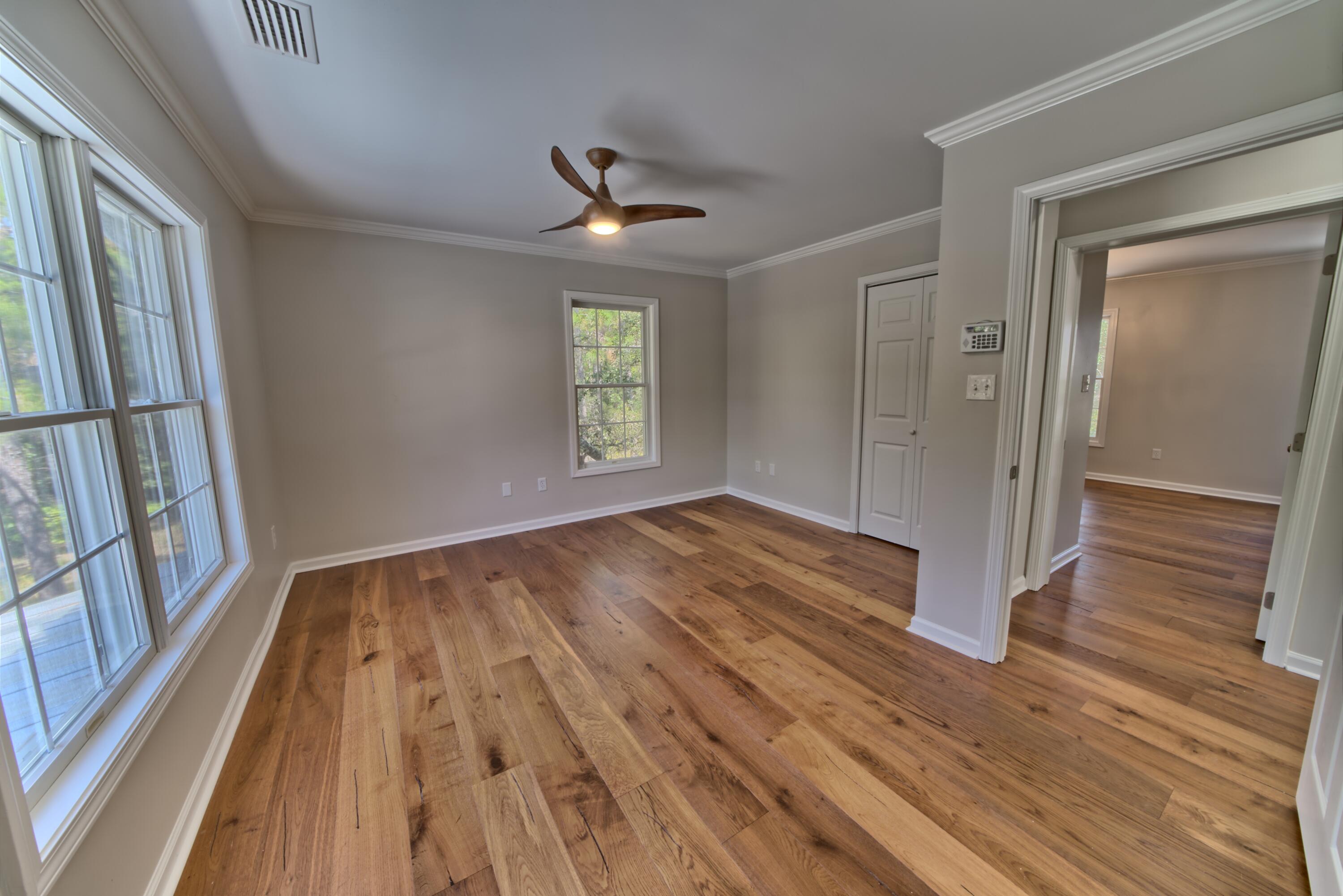 521 Clareon Drive Inlet Beach, FL 32461 - Photo 23 of 66 wooden floor in an empty room with a window