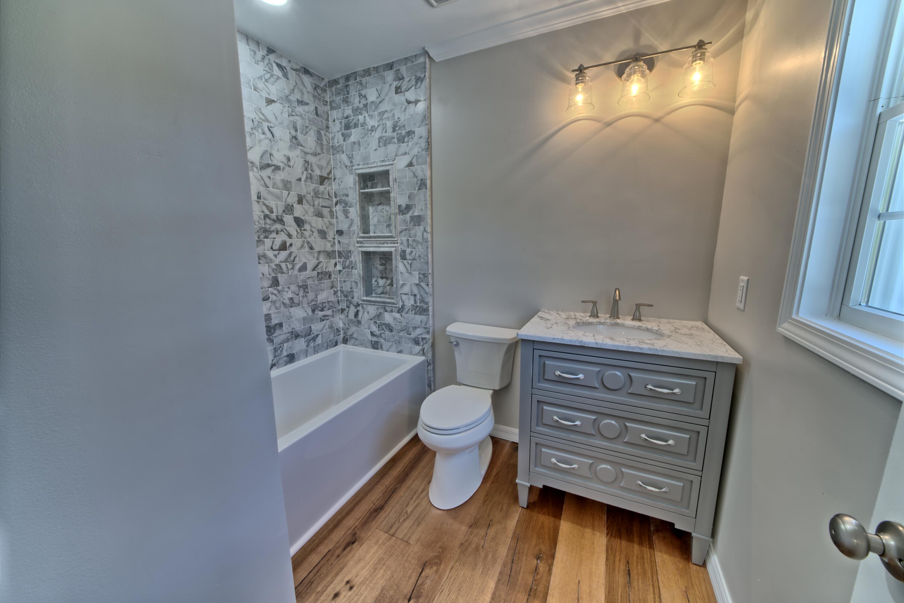 521 Clareon Drive Inlet Beach, FL 32461 - Photo 26 of 66 a bathroom with a sink toilet and shower