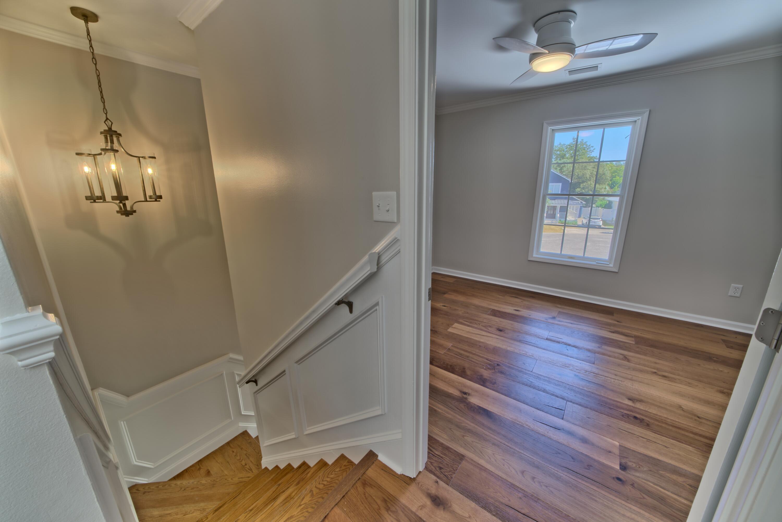 521 Clareon Drive Inlet Beach, FL 32461 - Photo 31 of 66 a view of a room with wooden floor and staircase