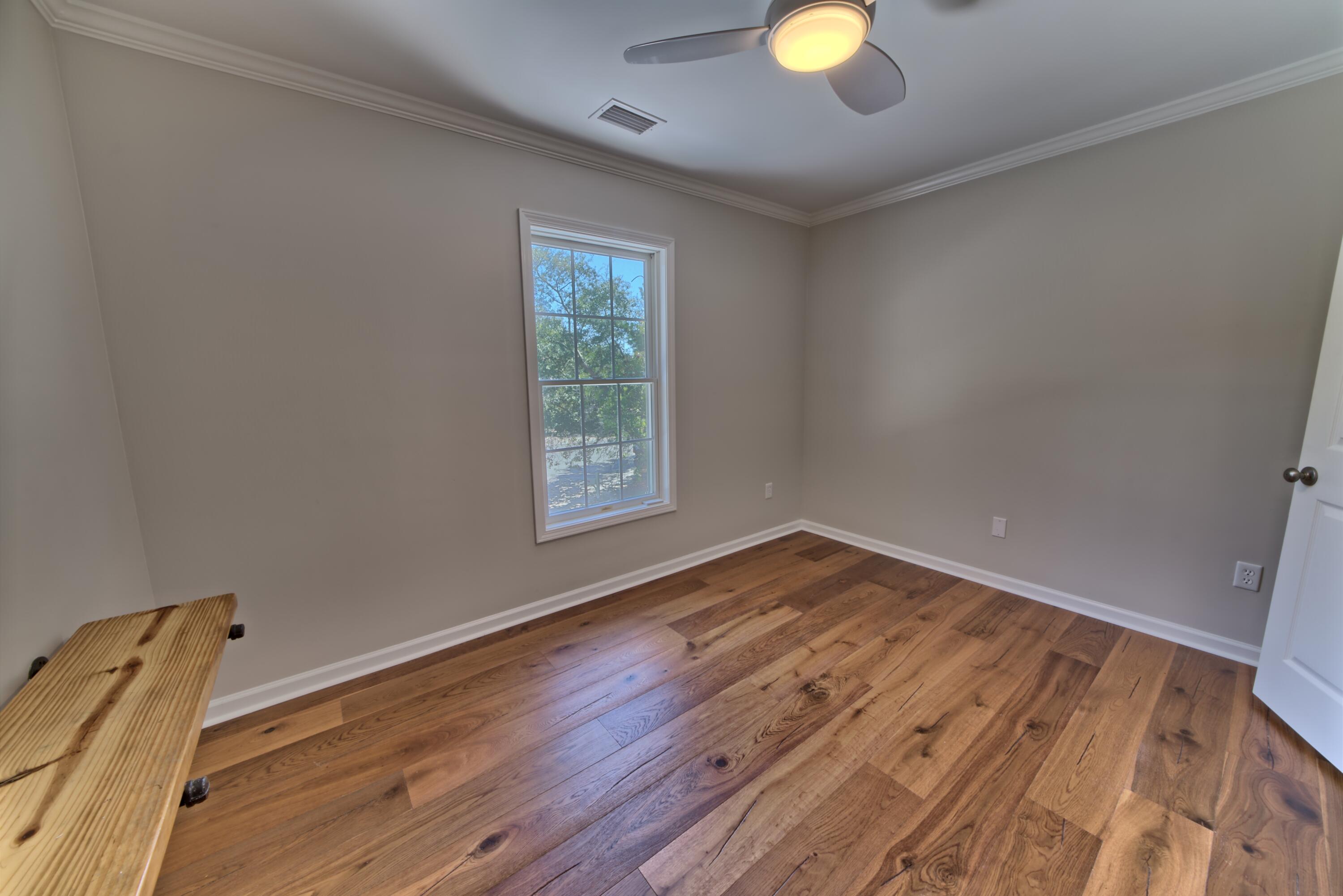 521 Clareon Drive Inlet Beach, FL 32461 - Photo 32 of 66 a view of empty room with wooden floor and fan