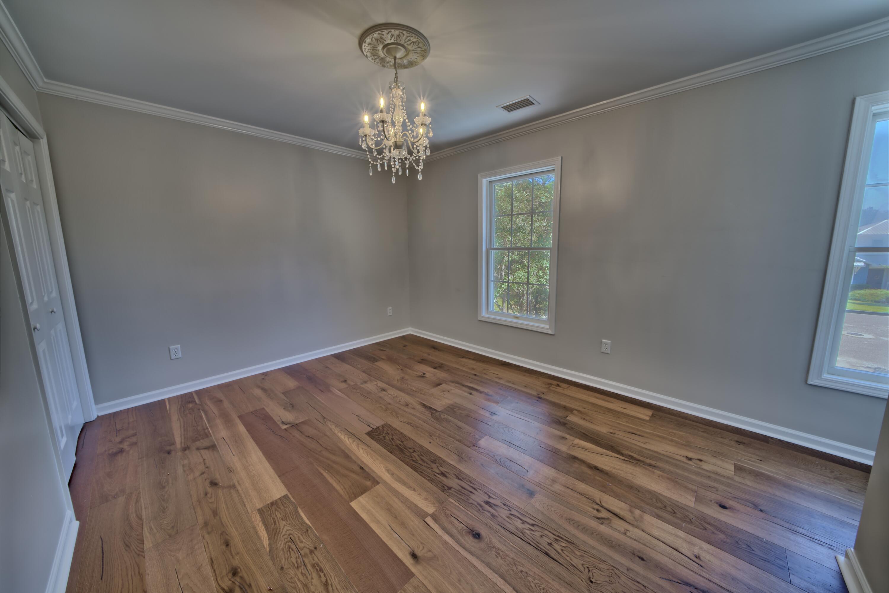 521 Clareon Drive Inlet Beach, FL 32461 - Photo 34 of 66 wooden floor in an empty room with a window