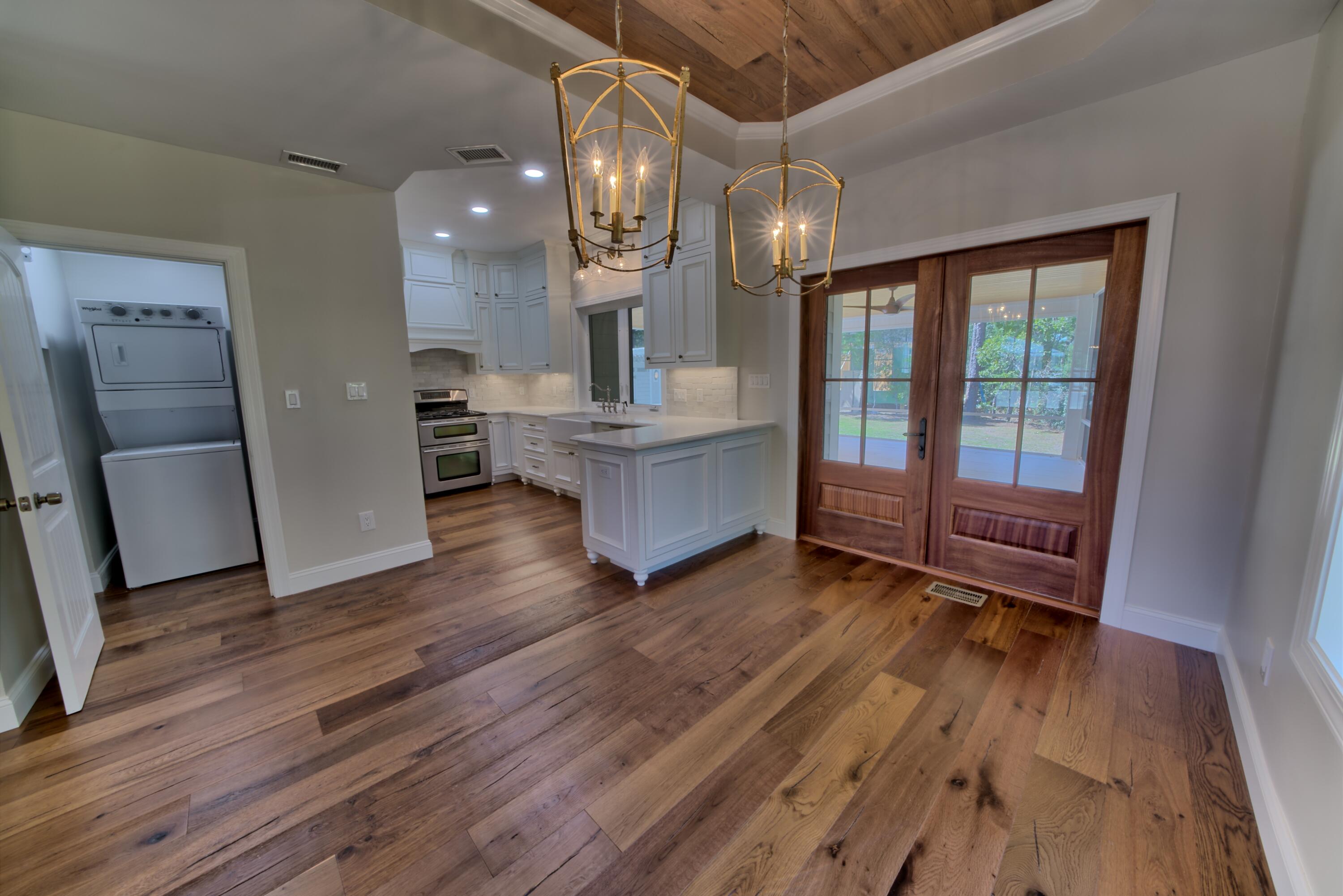 521 Clareon Drive Inlet Beach, FL 32461 - Photo 5 of 66 a living room with hard wood floors and a kitchen