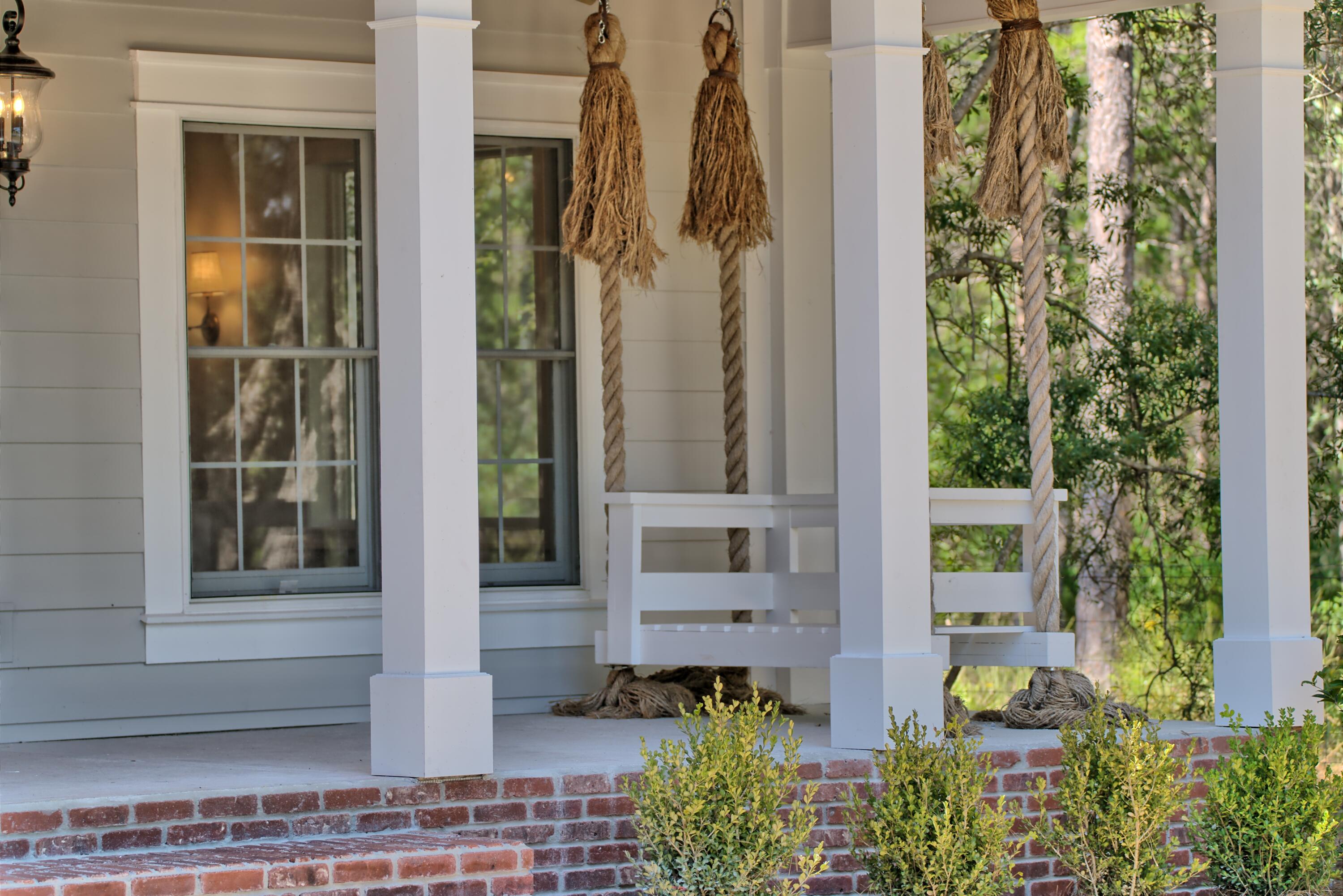 521 Clareon Drive Inlet Beach, FL 32461 - Photo 51 of 66 front view of a house with a potted plant and a potted plant
