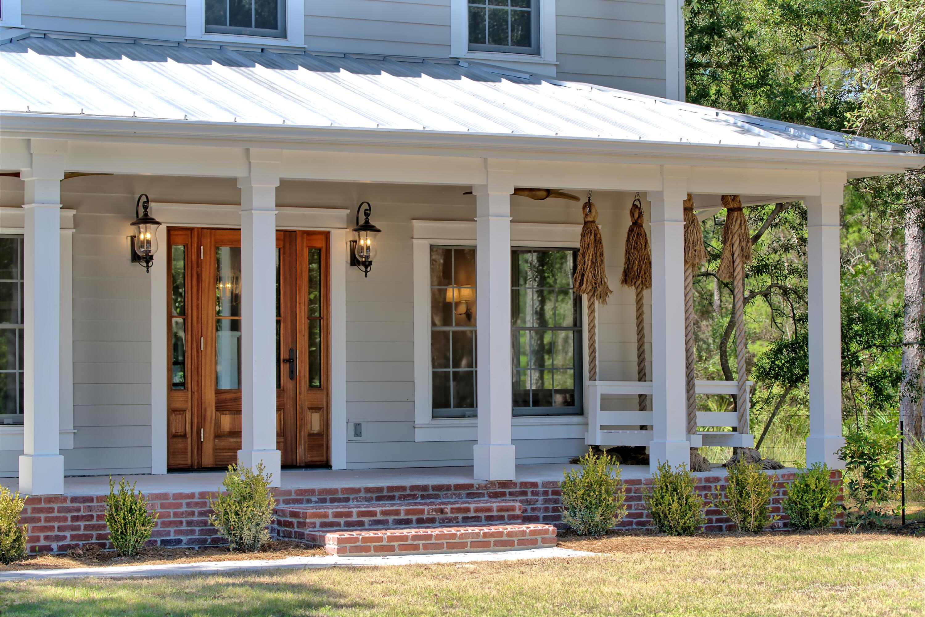 521 Clareon Drive Inlet Beach, FL 32461 - Photo 52 of 66 a front view of a house with a yard