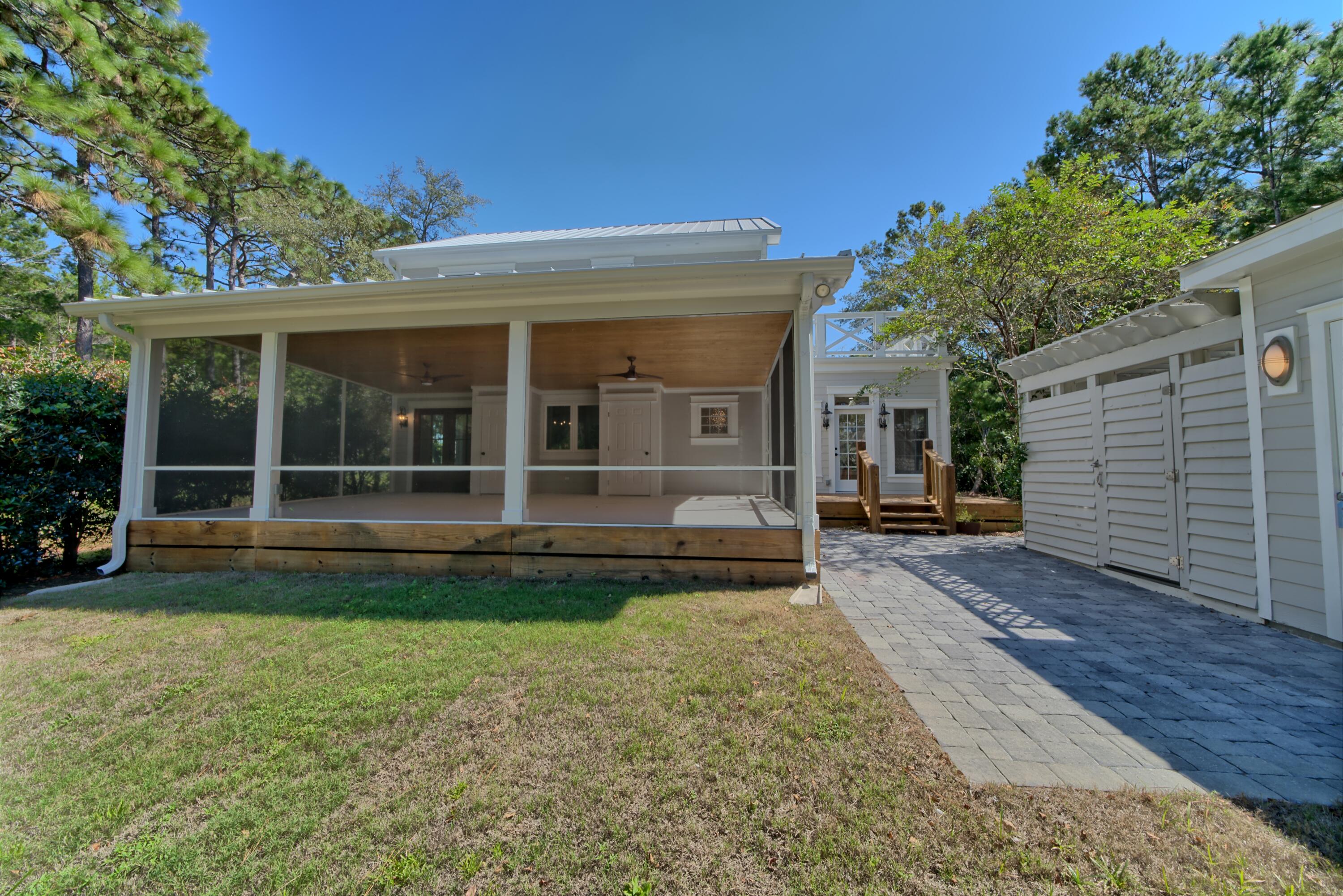 521 Clareon Drive Inlet Beach, FL 32461 - Photo 59 of 66 a view of a house with a yard