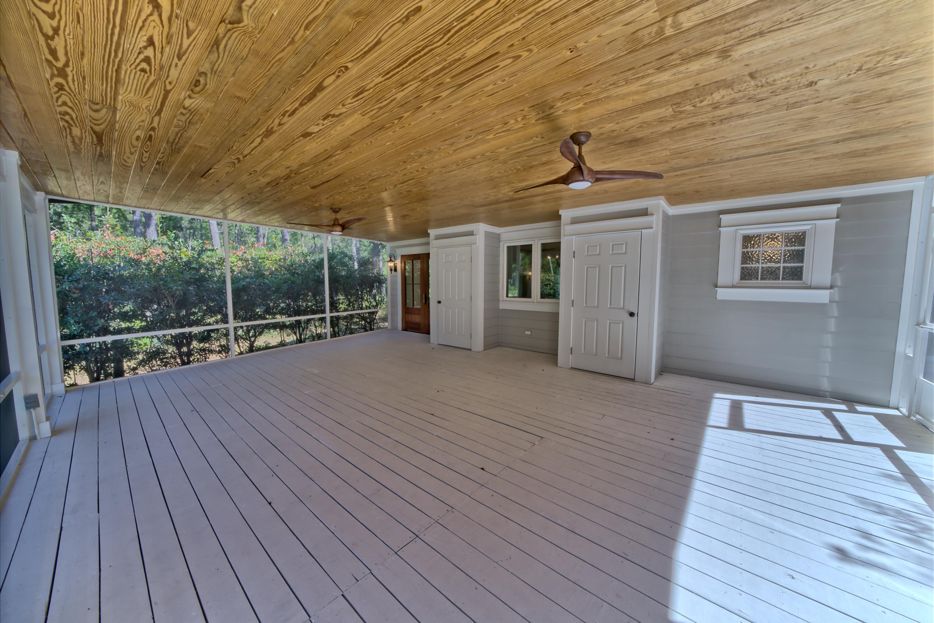 521 Clareon Drive Inlet Beach, FL 32461 - Photo 66 of 66 a view of a room with wooden floor and balcony