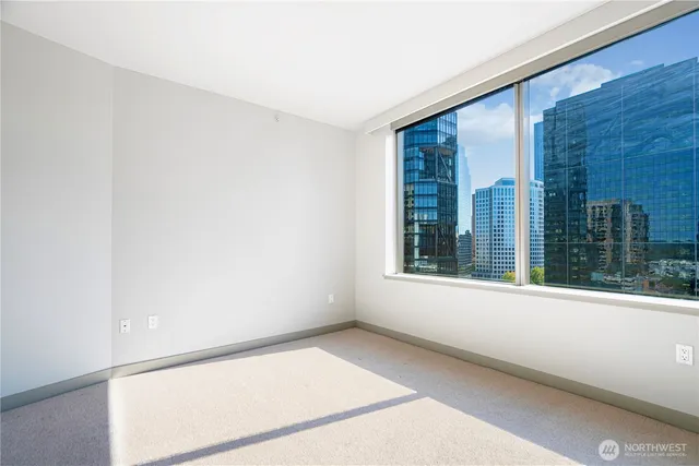 a view of an empty room with a window