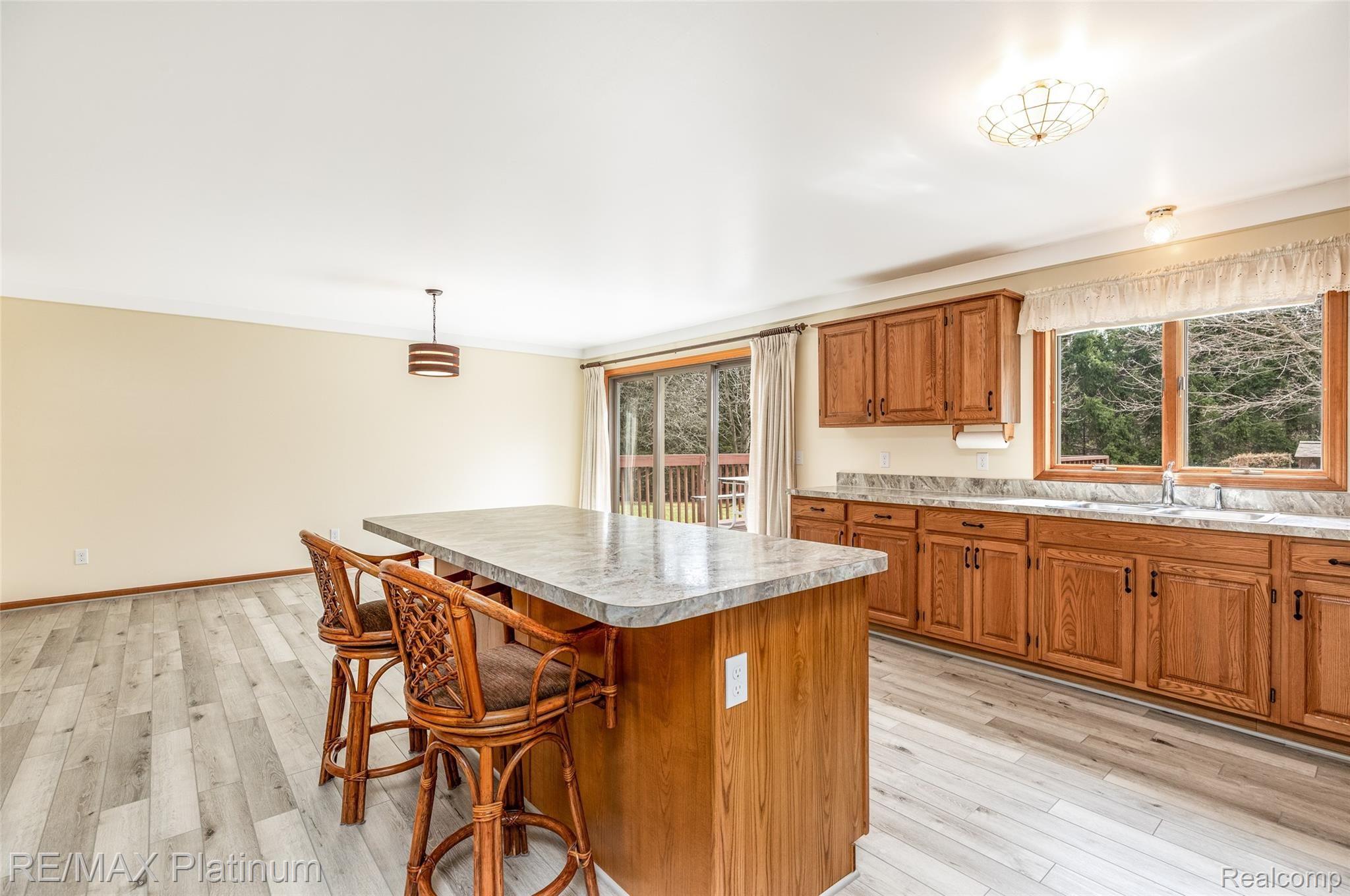 909 Chase Lake Road Howell, MI 48855 - Photo 37 of 37 Very open floor plan with plenty of room to gather!