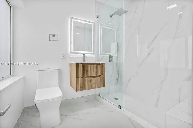 a bathroom with a sink and a toilet