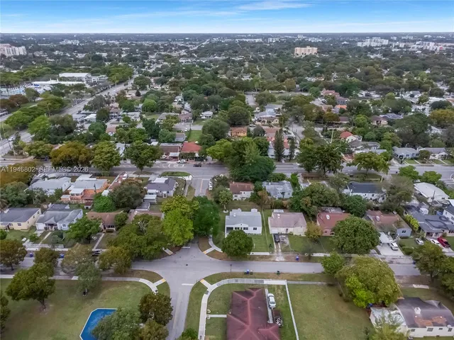 an aerial view of a city with lots of residential buildings
