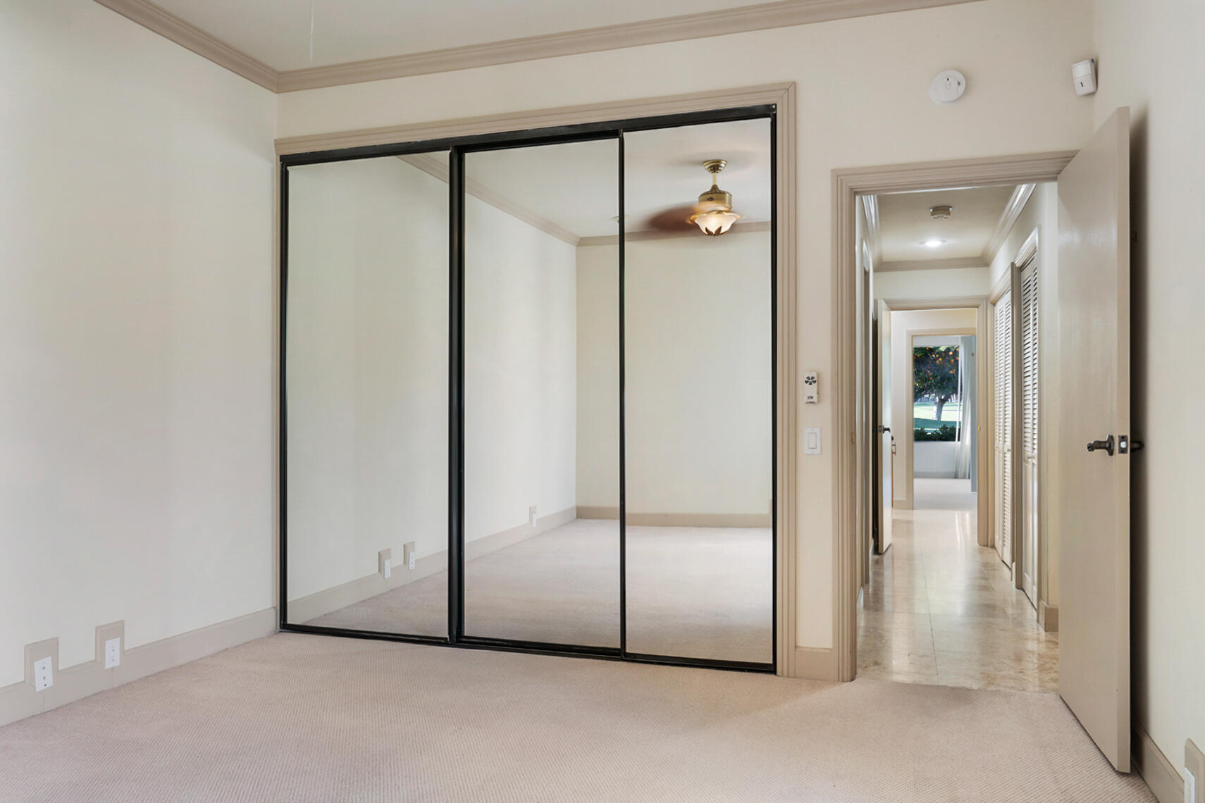 137 Desert W Drive Rancho Mirage, CA 92270 - Photo 25 of 56 an empty room with mirror and closet