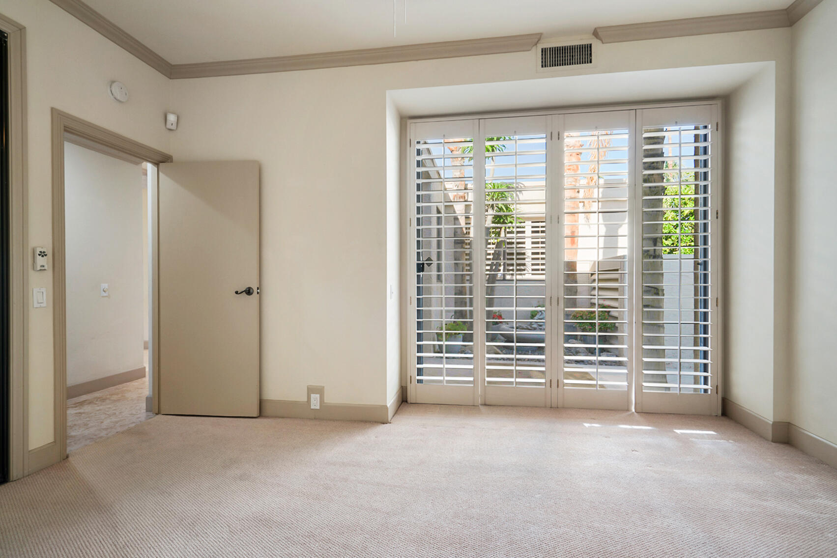 137 Desert W Drive Rancho Mirage, CA 92270 - Photo 28 of 56 a view of an empty room with a window