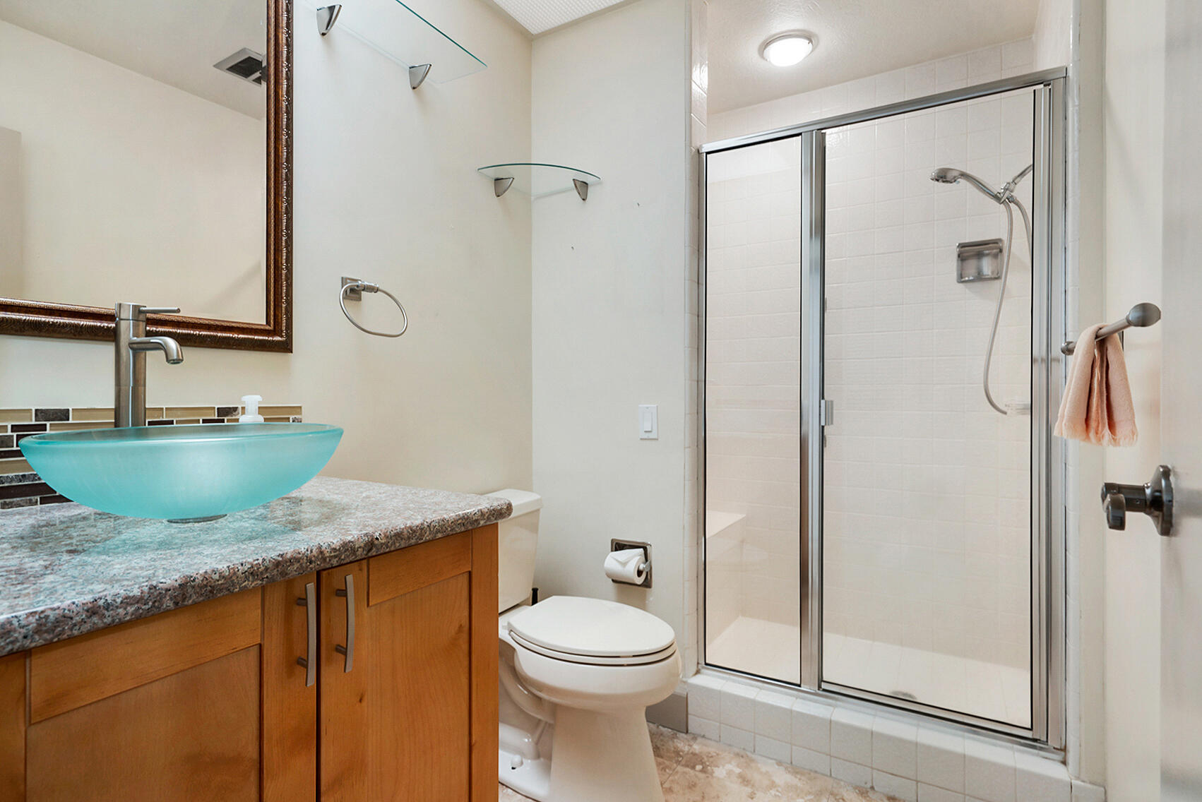 137 Desert W Drive Rancho Mirage, CA 92270 - Photo 29 of 56 a bathroom with a granite countertop sink toilet and shower
