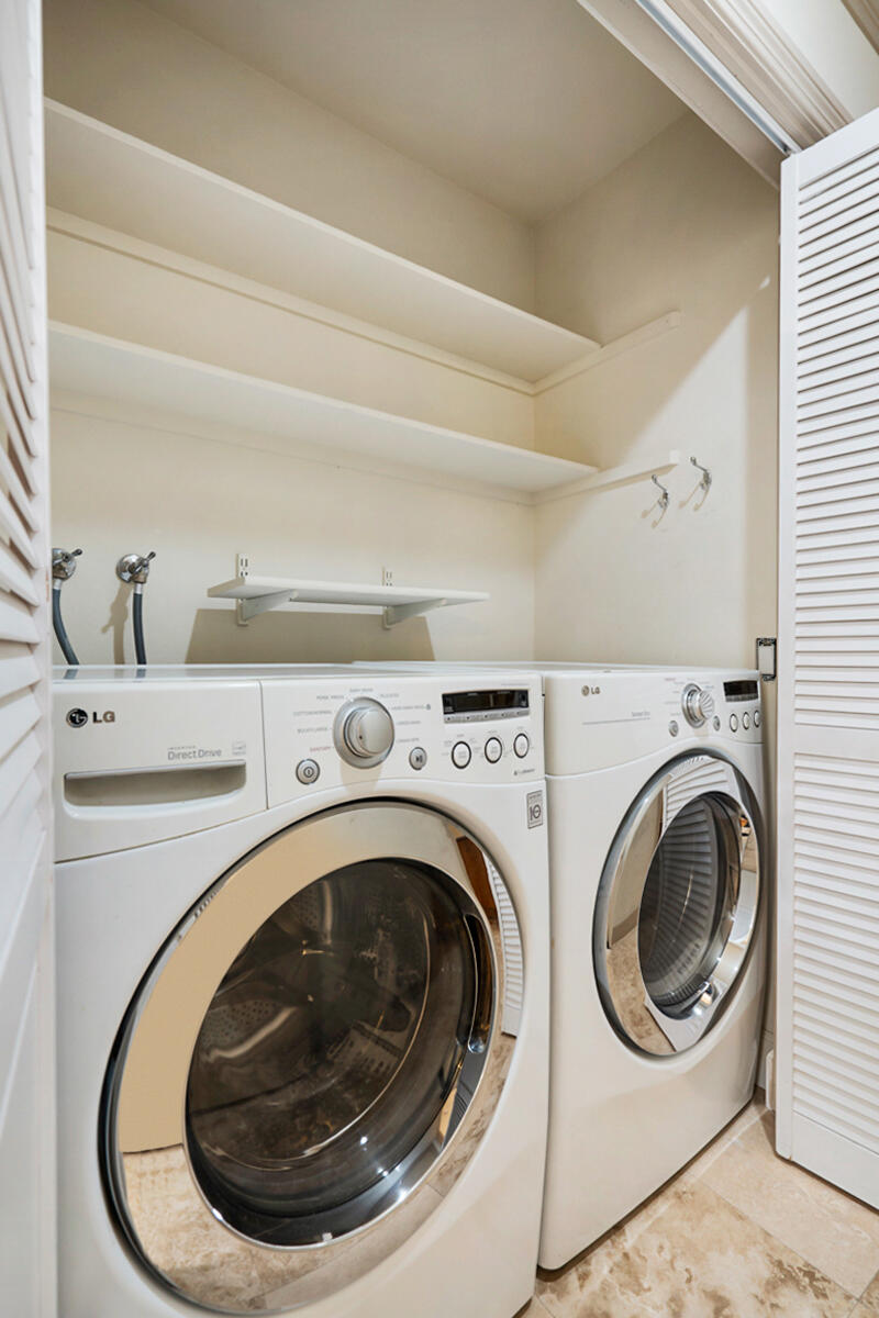 137 Desert W Drive Rancho Mirage, CA 92270 - Photo 30 of 56 a utility room with dryer and washer