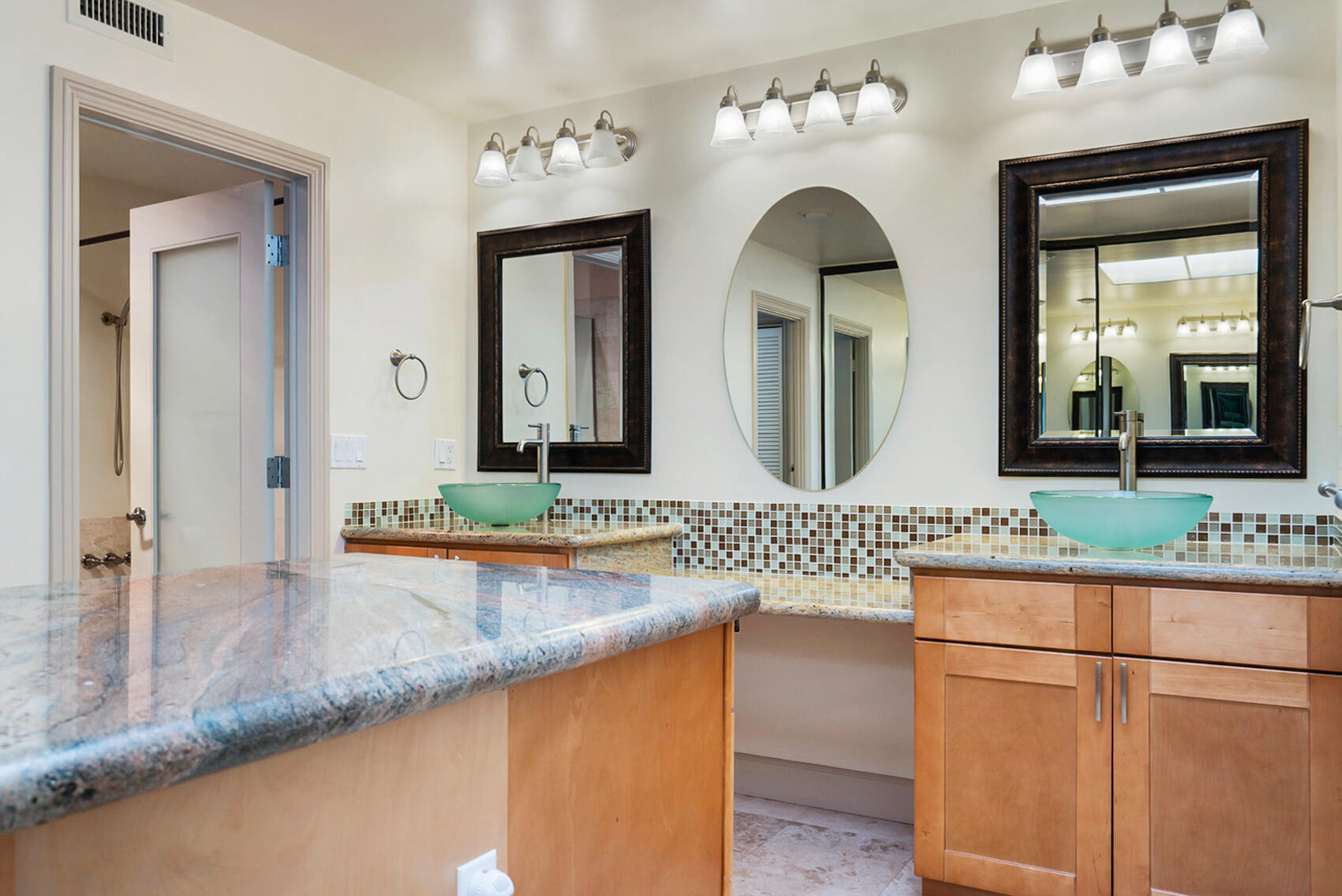 137 Desert W Drive Rancho Mirage, CA 92270 - Photo 32 of 56 a bathroom with a granite countertop sink and a mirror