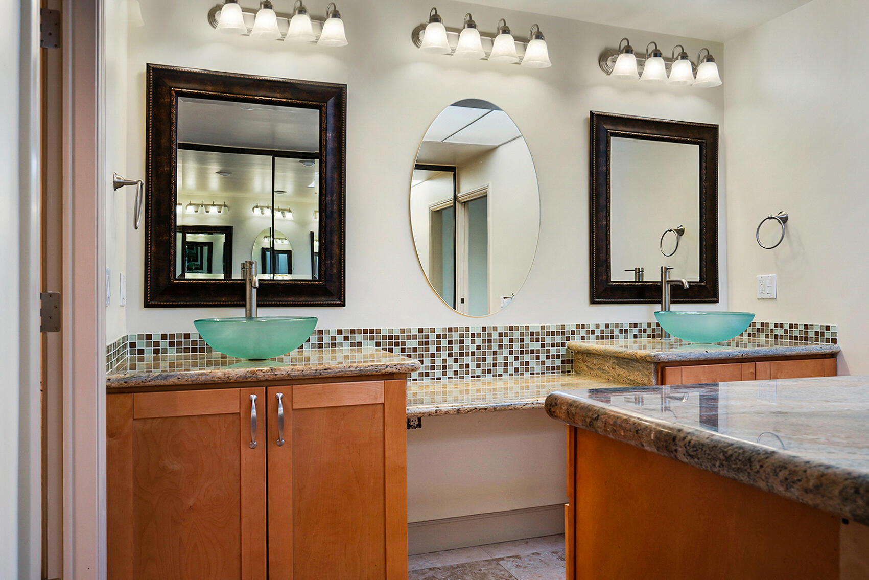137 Desert W Drive Rancho Mirage, CA 92270 - Photo 34 of 56 a bathroom with a sink and a mirror