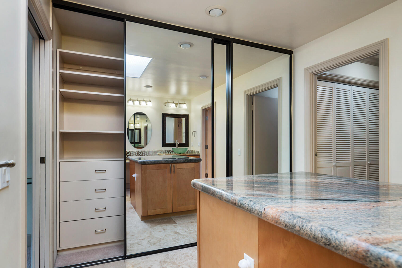 137 Desert W Drive Rancho Mirage, CA 92270 - Photo 35 of 56 a kitchen with stainless steel appliances granite countertop a sink and a refrigerator