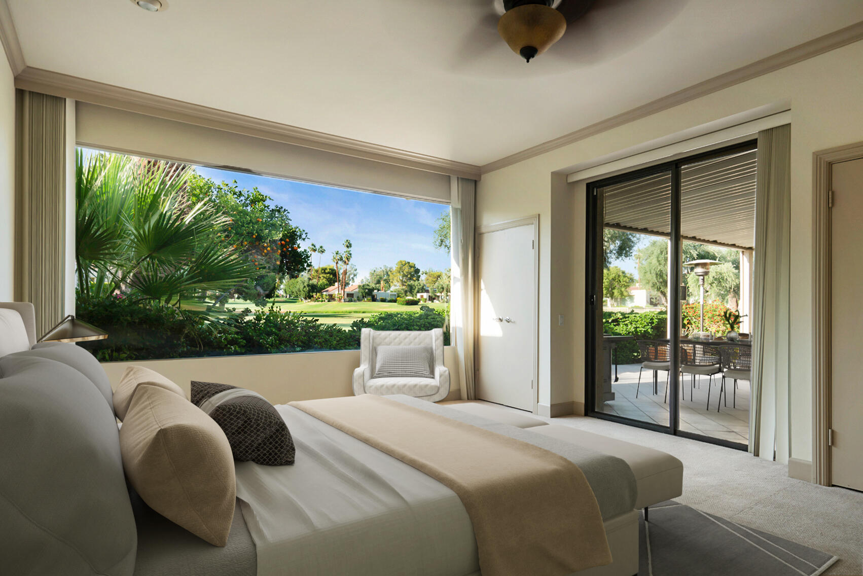 137 Desert W Drive Rancho Mirage, CA 92270 - Photo 40 of 56 a bedroom with a bed and large window