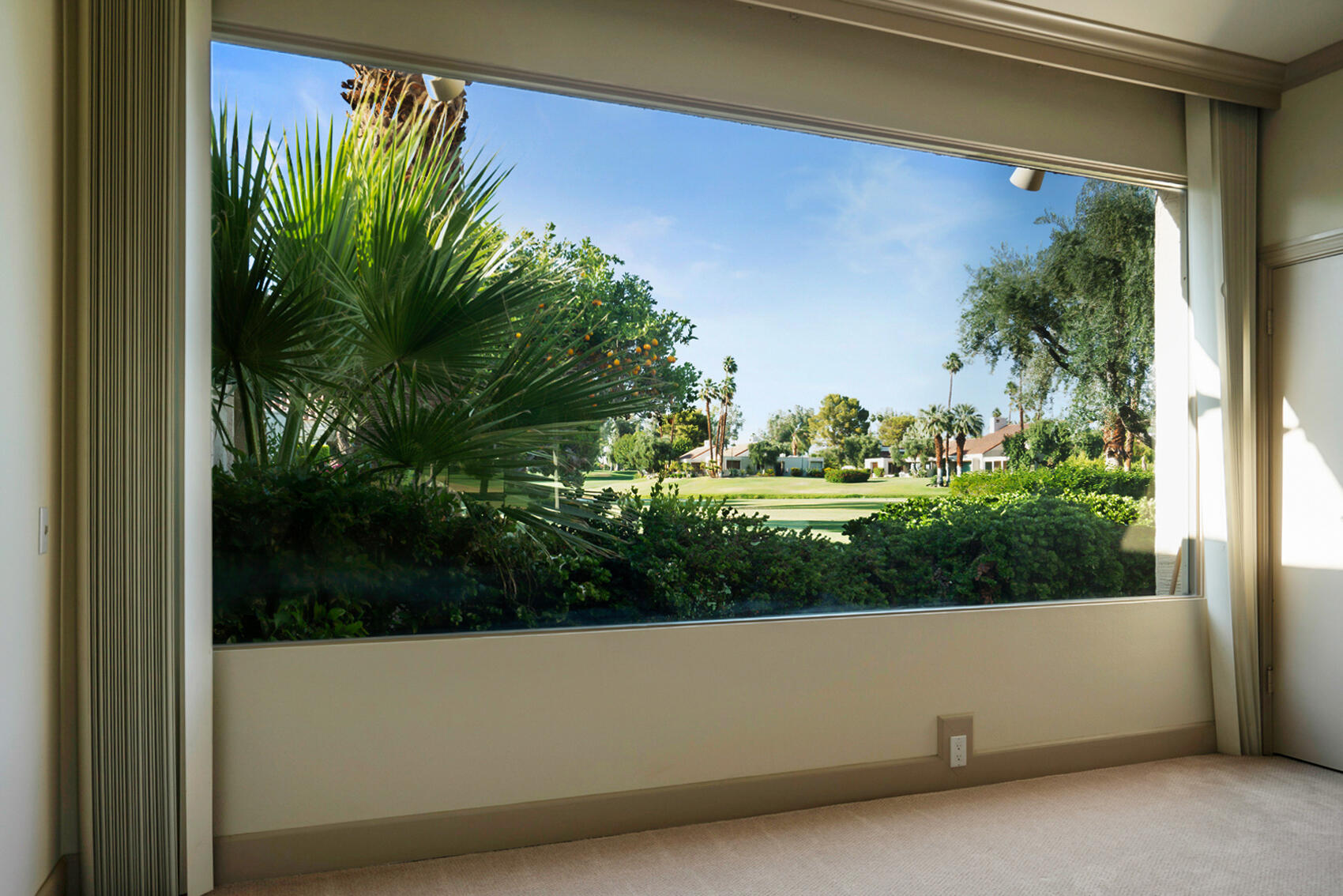 137 Desert W Drive Rancho Mirage, CA 92270 - Photo 41 of 56 a view of a lot of a building from a window