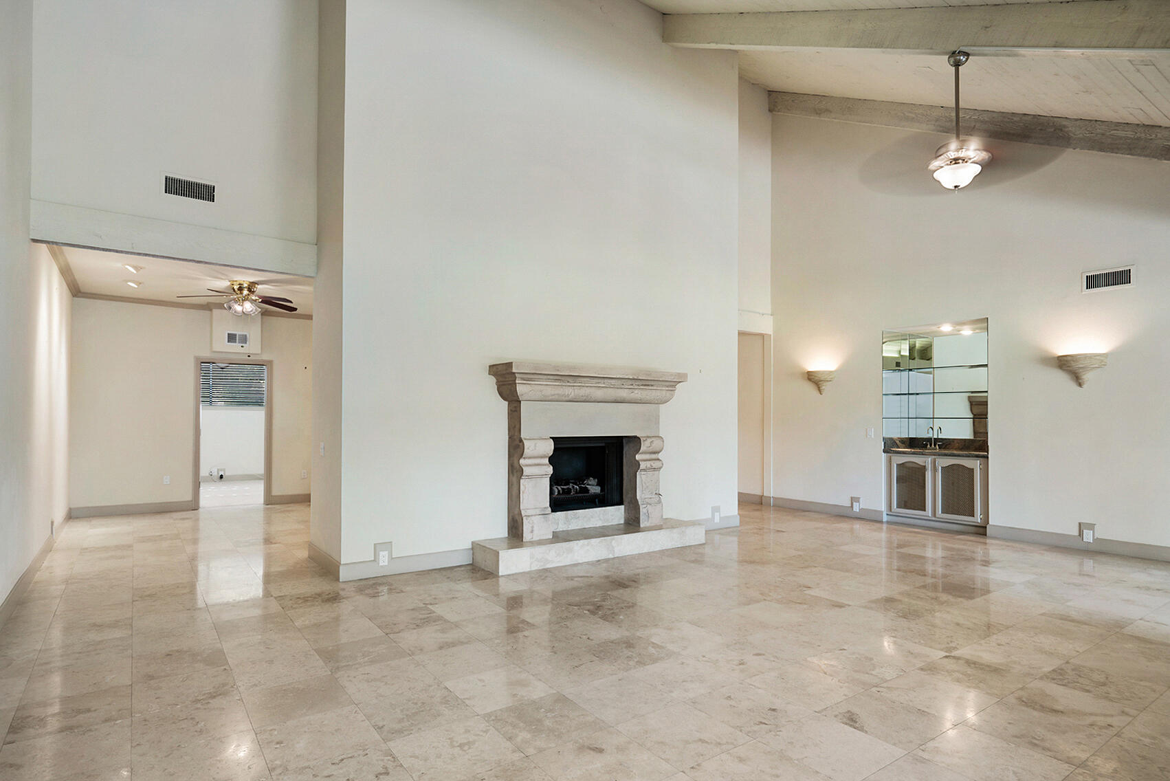 137 Desert W Drive Rancho Mirage, CA 92270 - Photo 9 of 56 an empty room with a fireplace