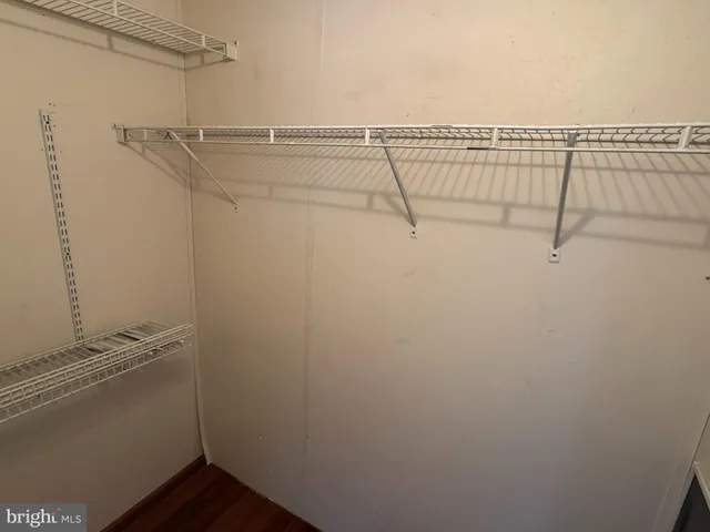 a view of a room with racks on the wall